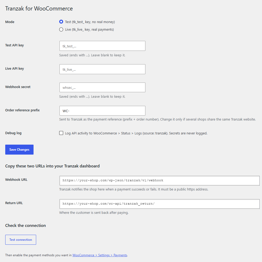 La page WooCommerce → Tranzak : mode, clé API, secret webhook, adresse du webhook et adresse de retour